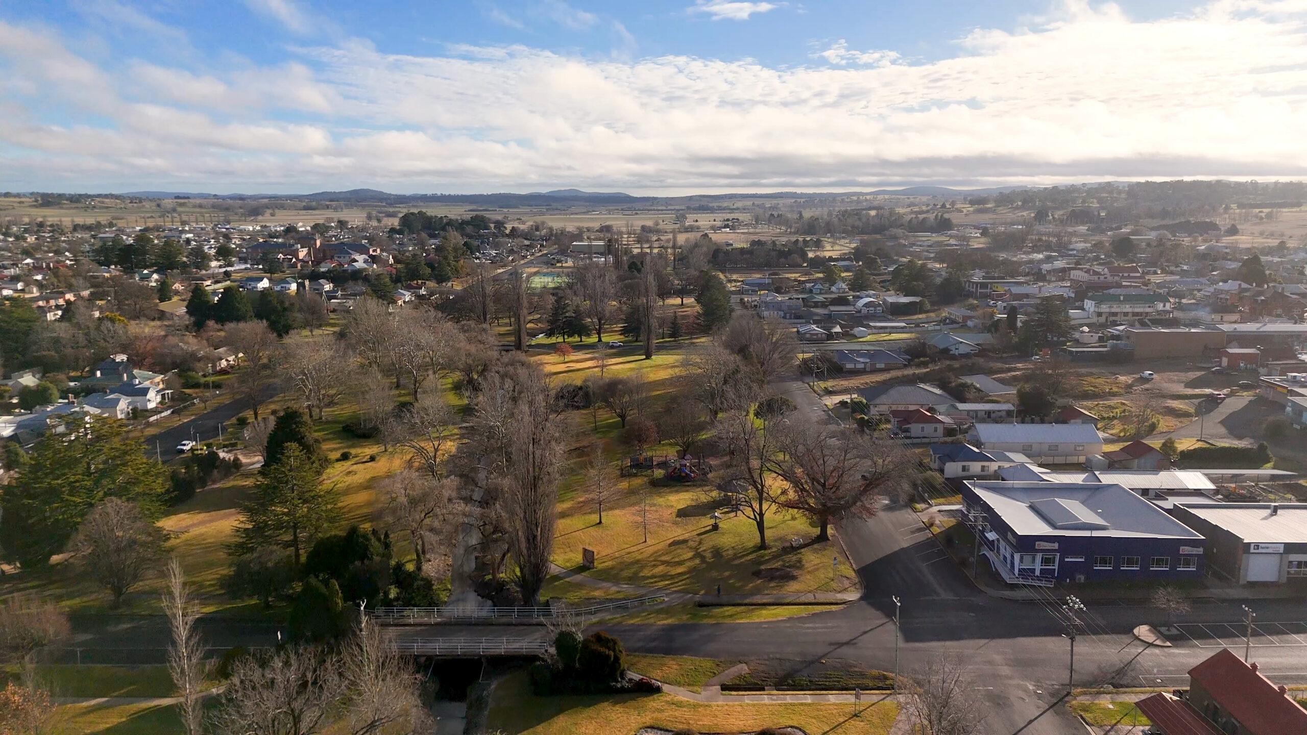 An aerial view of houses and trees