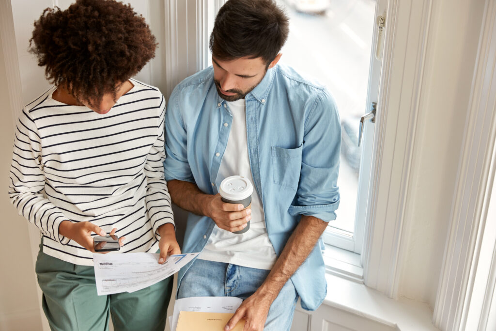 two people working on money issues
