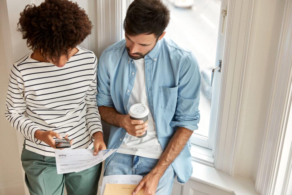 two people working on money issues