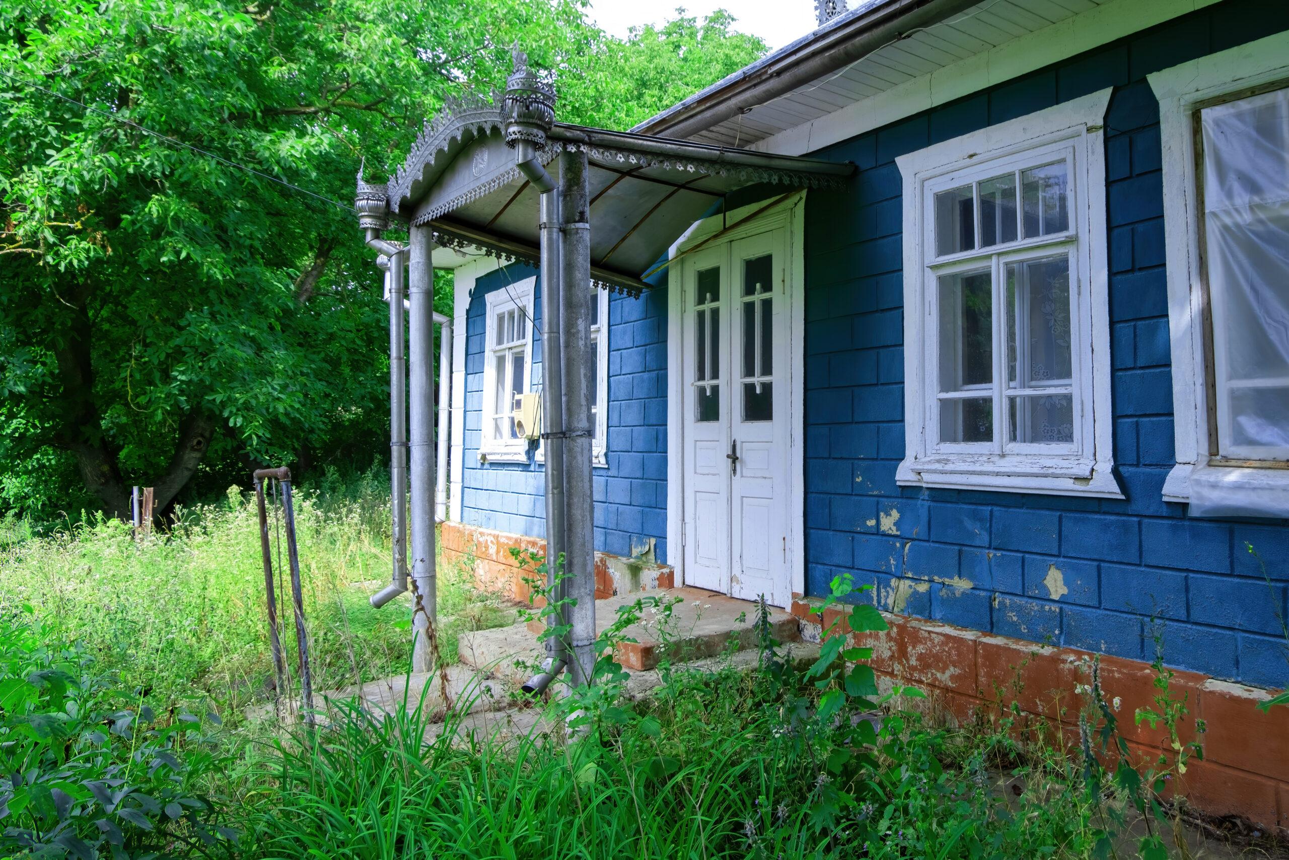 A rural cottage among trees
