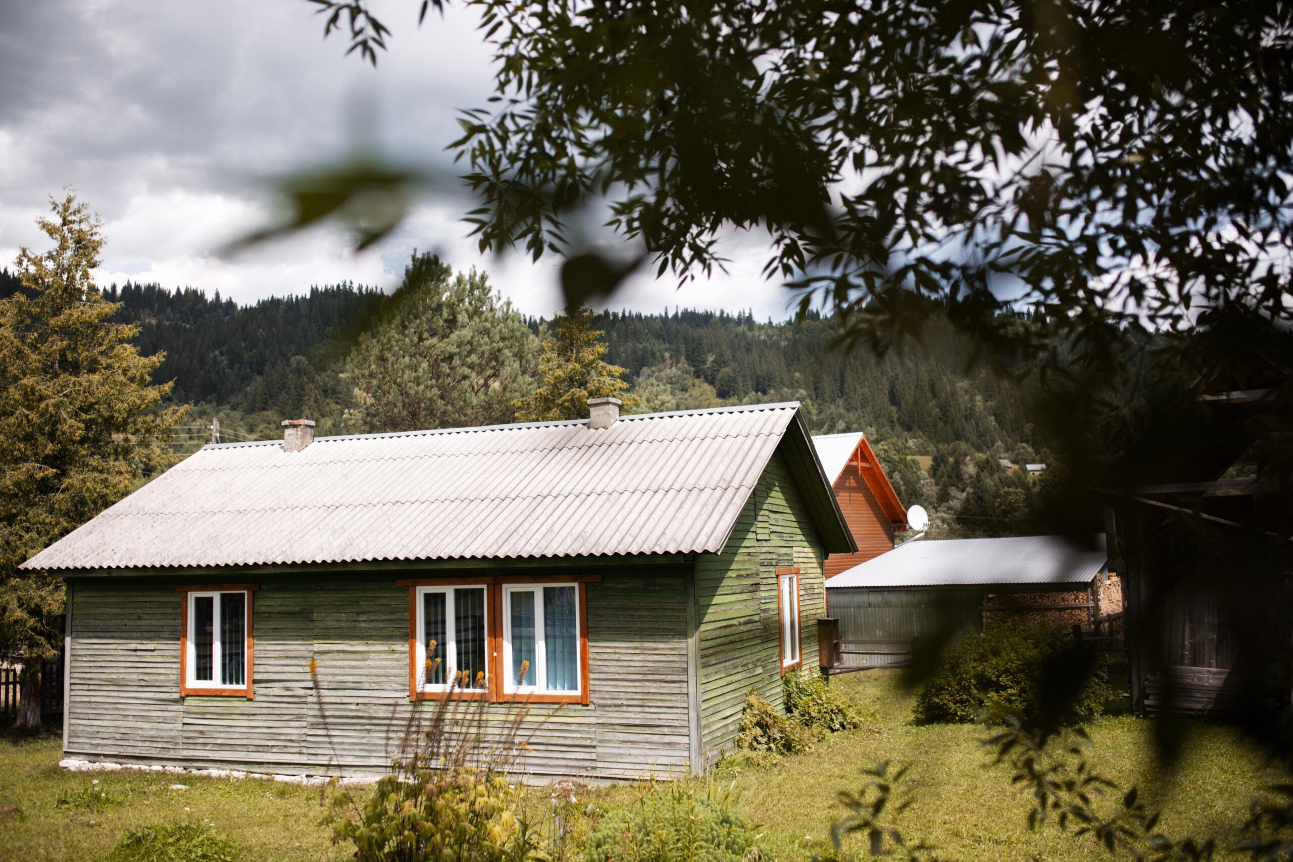 A rural cottage among trees